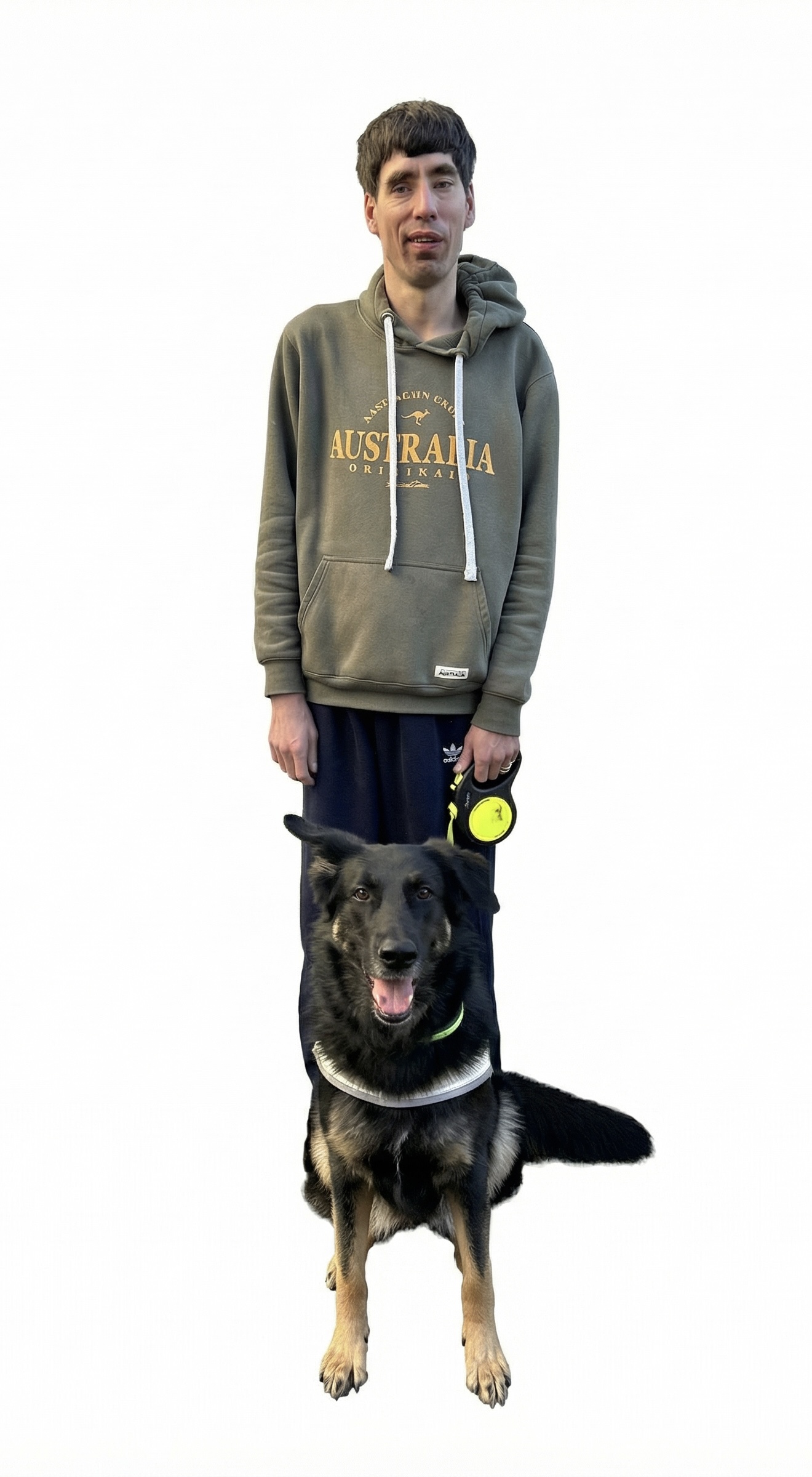 Steve Weidel mit seinem Blindenführhund, einem schwarzen Schäferhund-Mix mit Geschirr